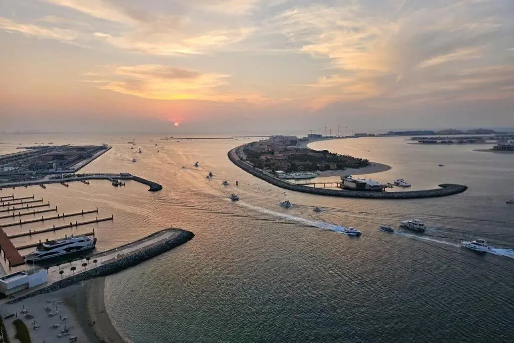 Panoramic sunset view of the marina and Arabian Gulf at Emaar Beachfront
